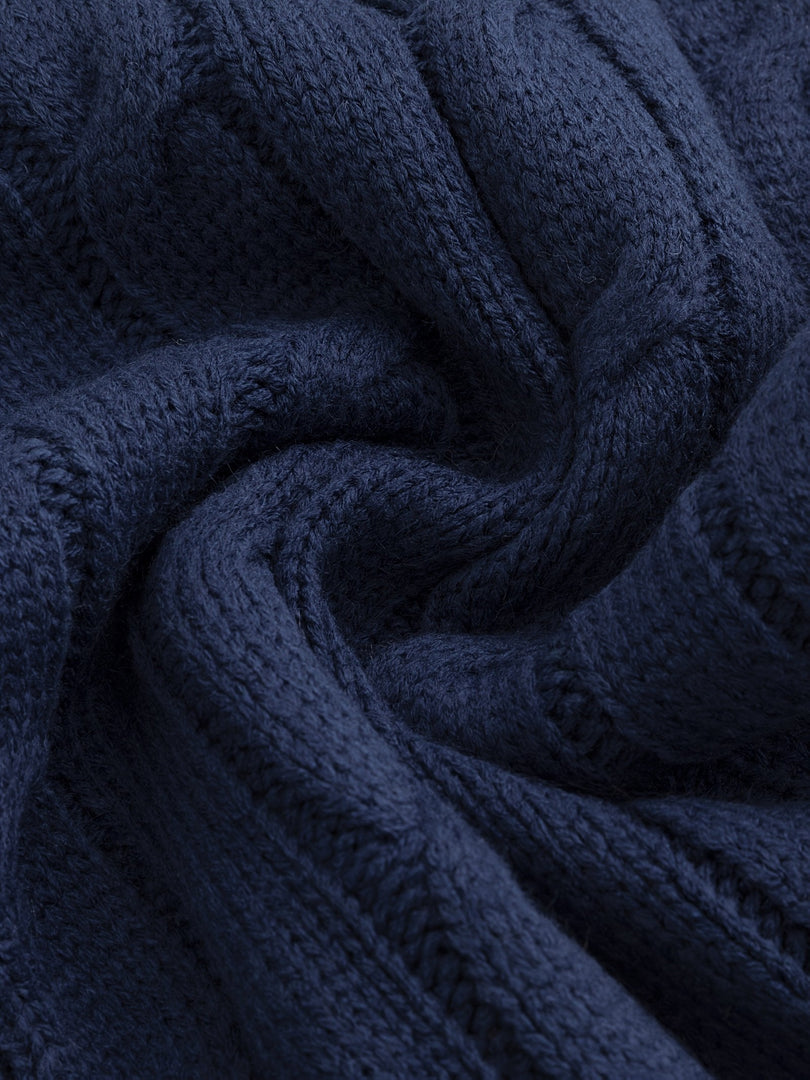 Close-up of the navy cable knit