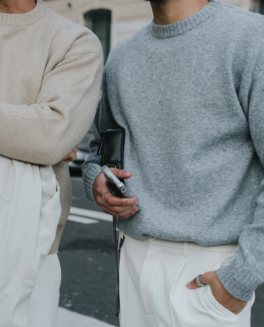 Men wearing the fine knit crew neck sweater in beige and grey