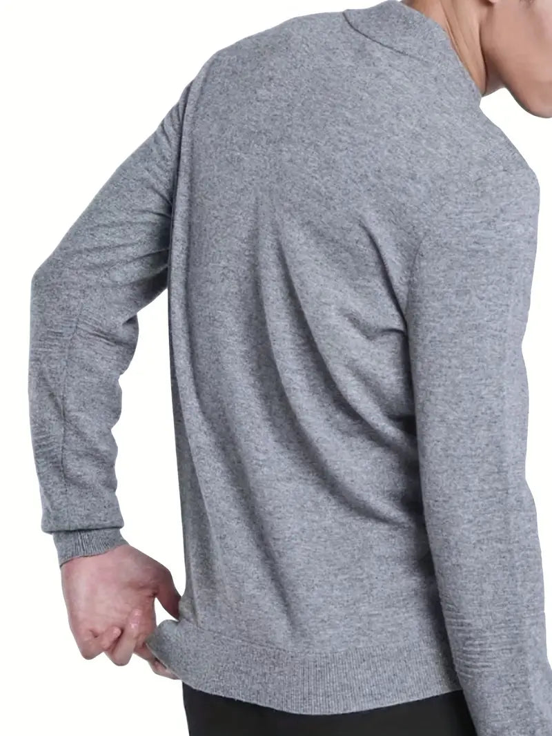 Man wearing the half-zip knit sweater in grey – side view
