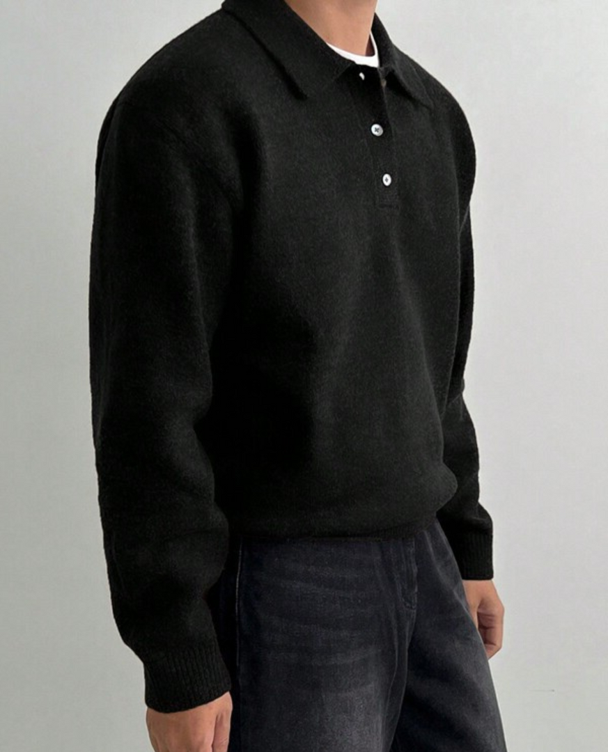 Man wearing the knit polo sweater in black – side view