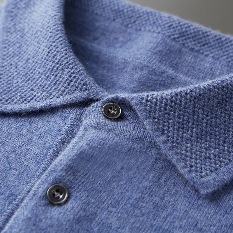 Close-up of the collar and buttons on the men's knit polo sweater