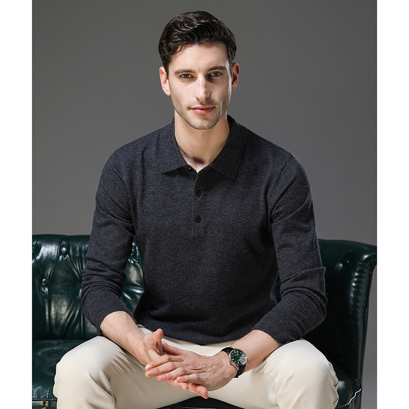 Man seated wearing the knit polo sweater in black
