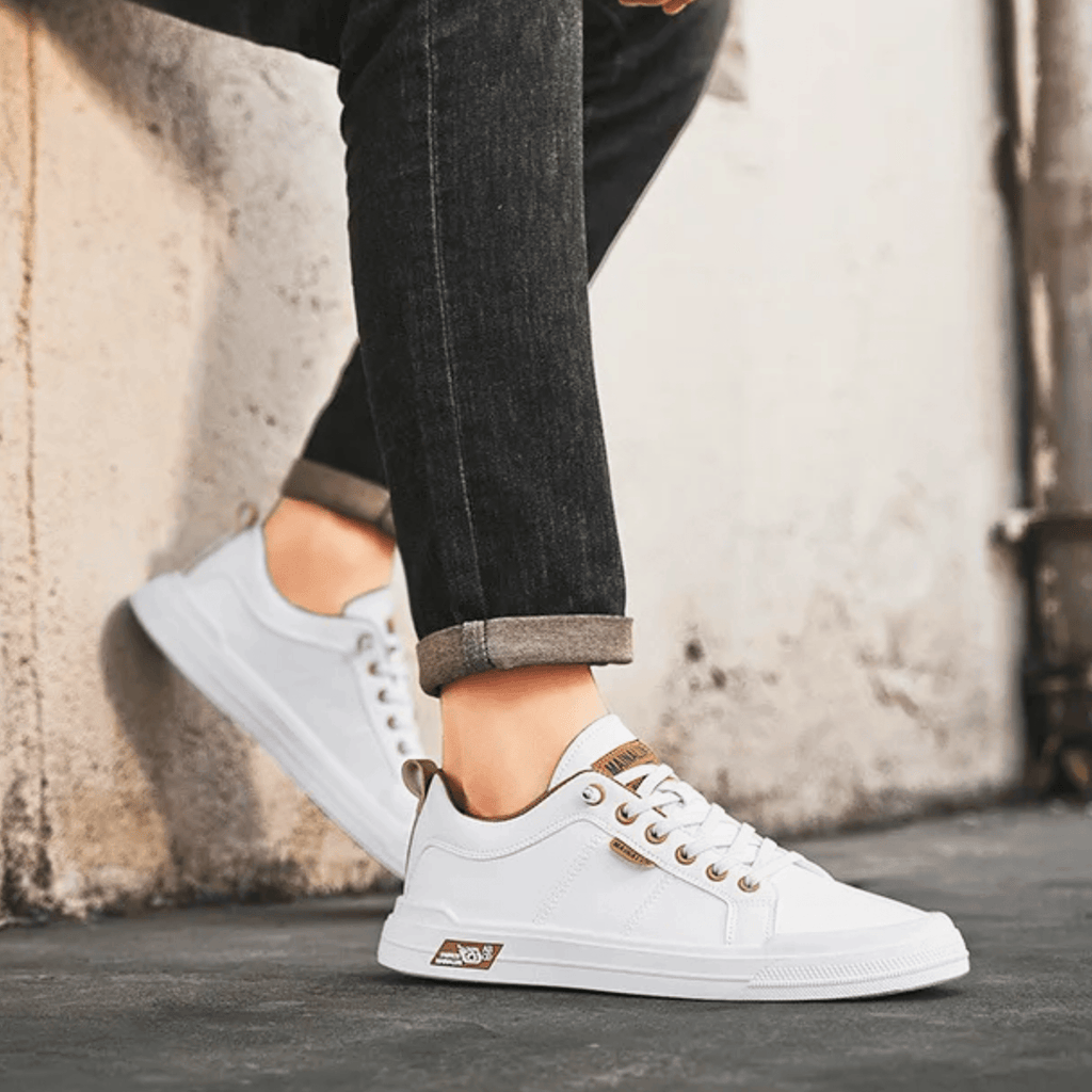 Men's lace-up sneakers in white – side view worn