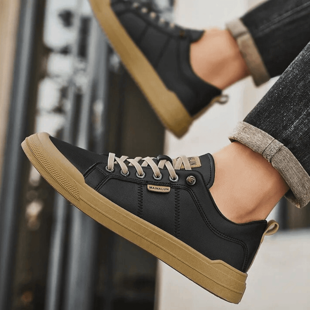 Men's lace-up sneakers in black – side view worn