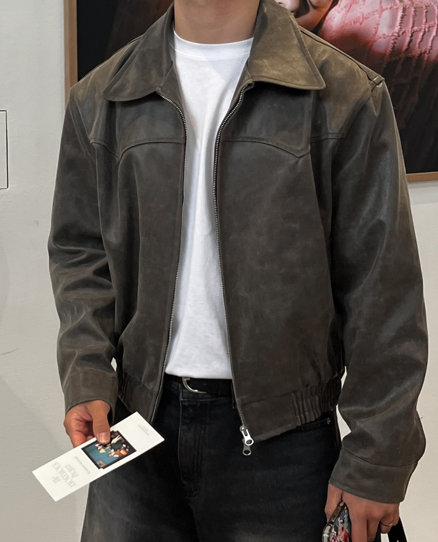 Man wearing the leather-look zip jacket in brown – front view