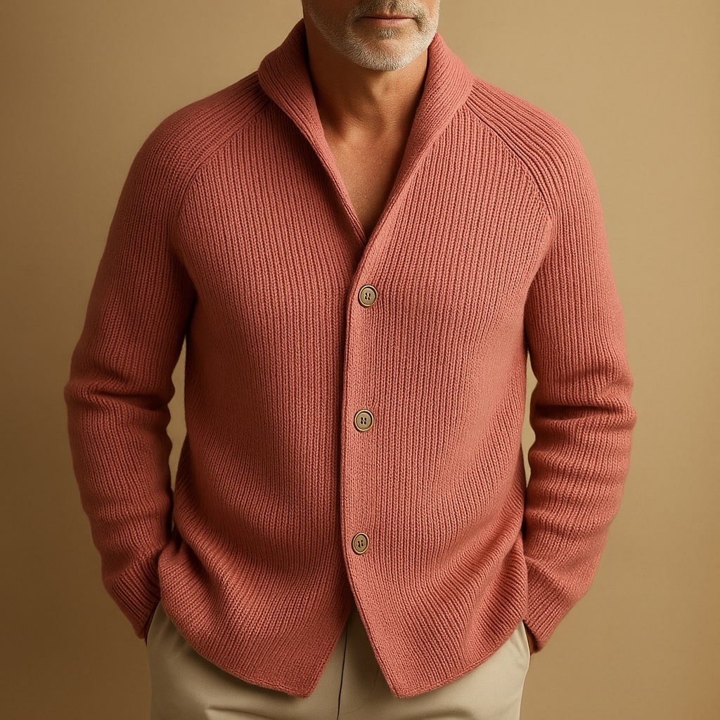 Man wearing the ribbed shawl collar cardigan in coral