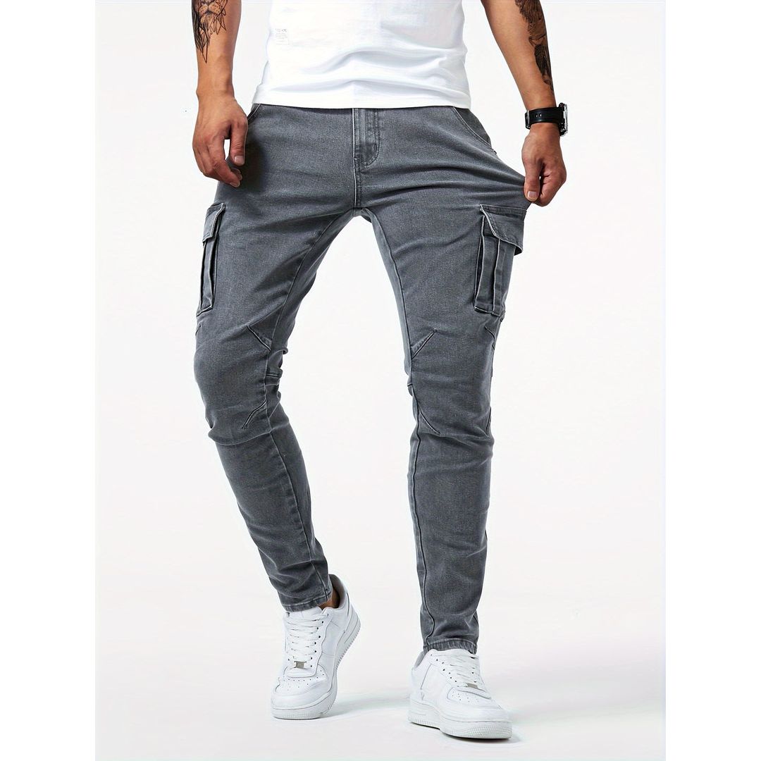 Men's slim fit cargo jeans in grey, worn