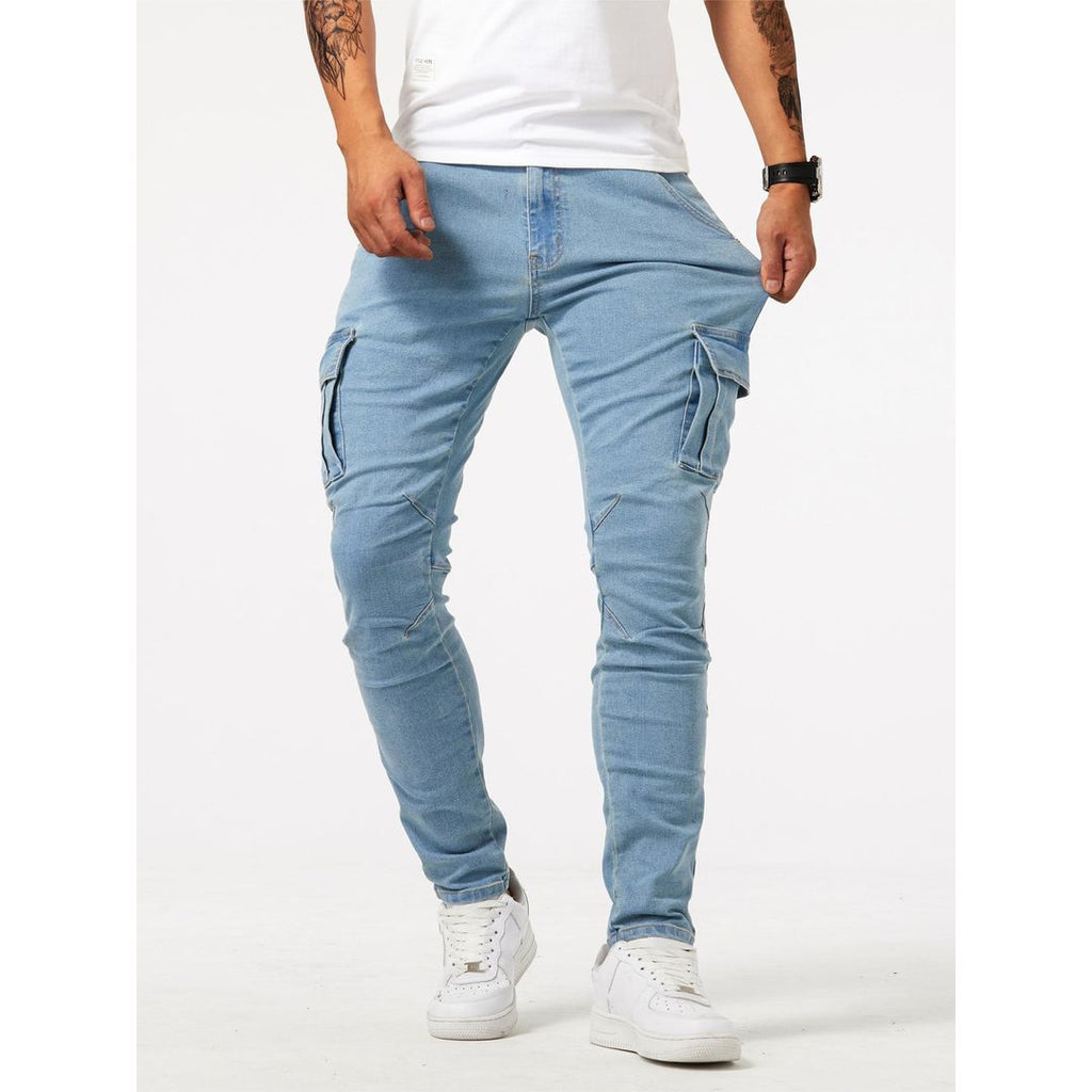 Men's slim fit cargo jeans in light blue, worn