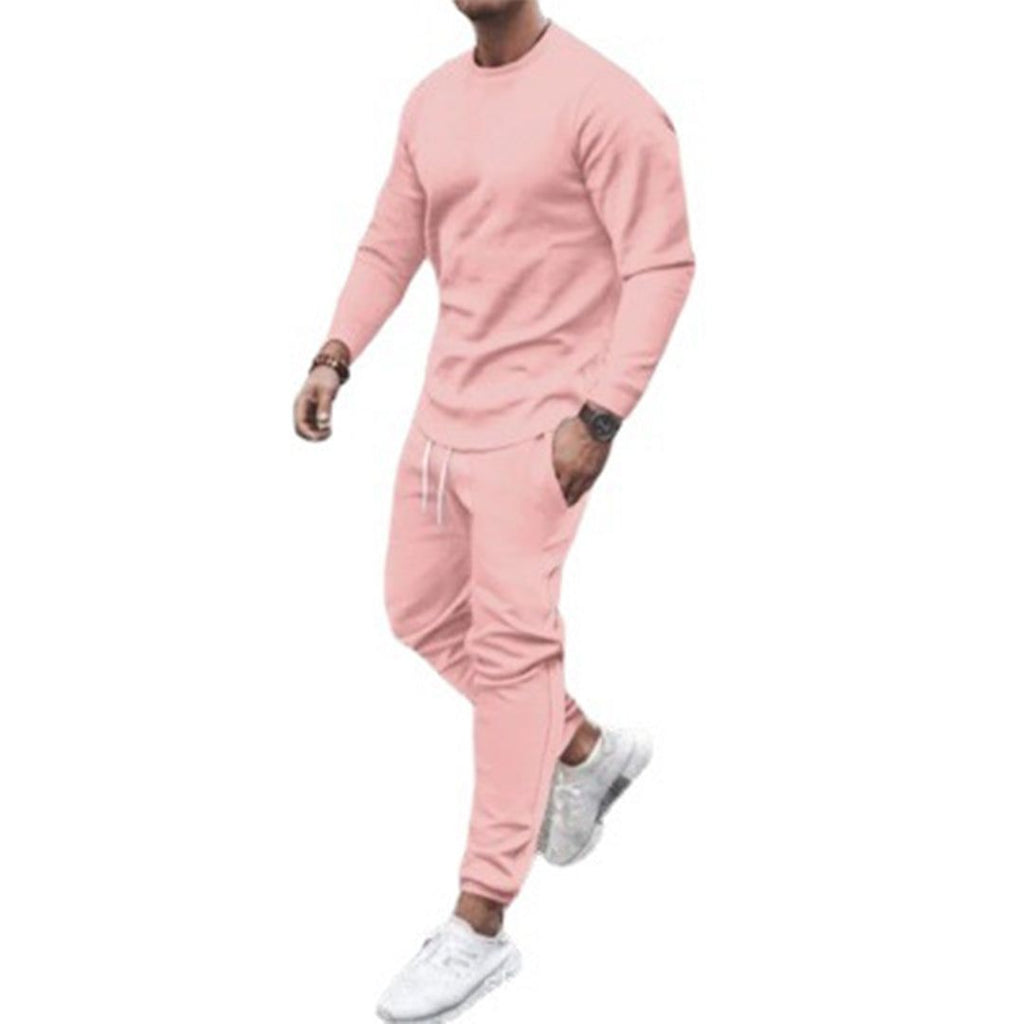 Men's slim fit sweatshirt and jogger set in pink, studio view