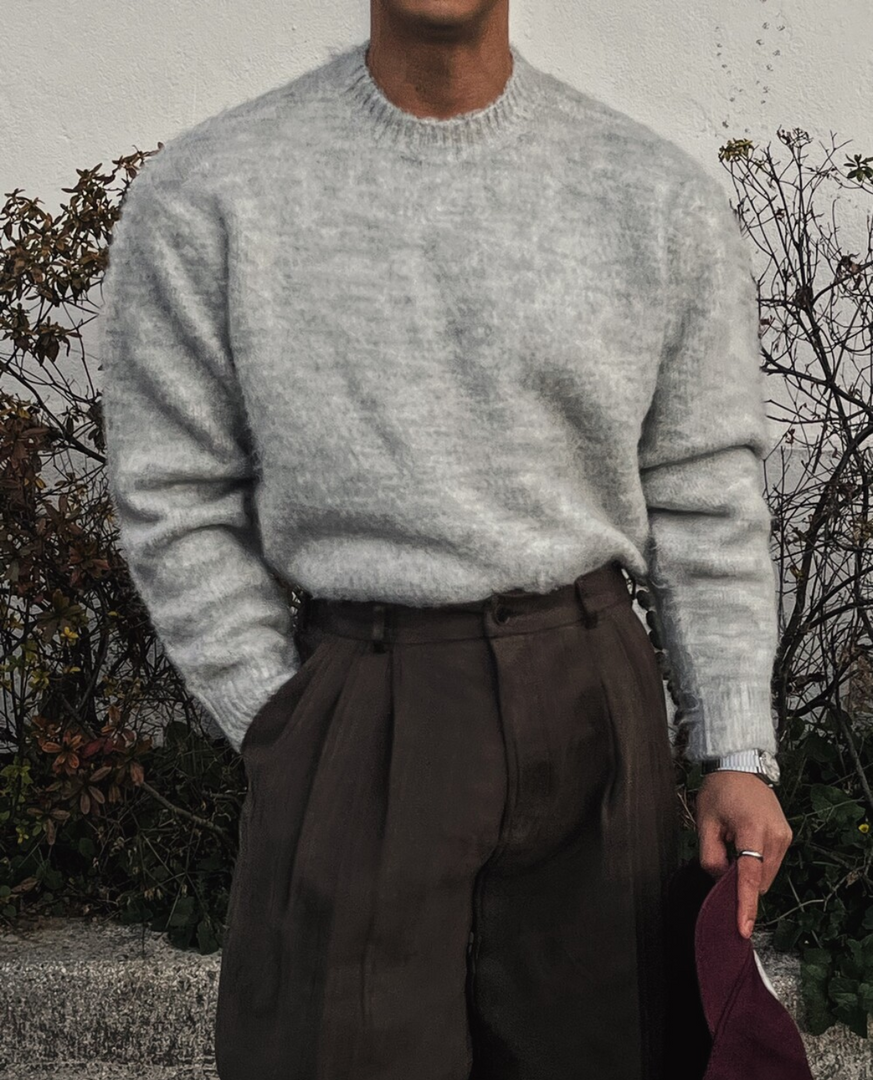 Man wearing the soft knit crew neck sweater in grey – front view