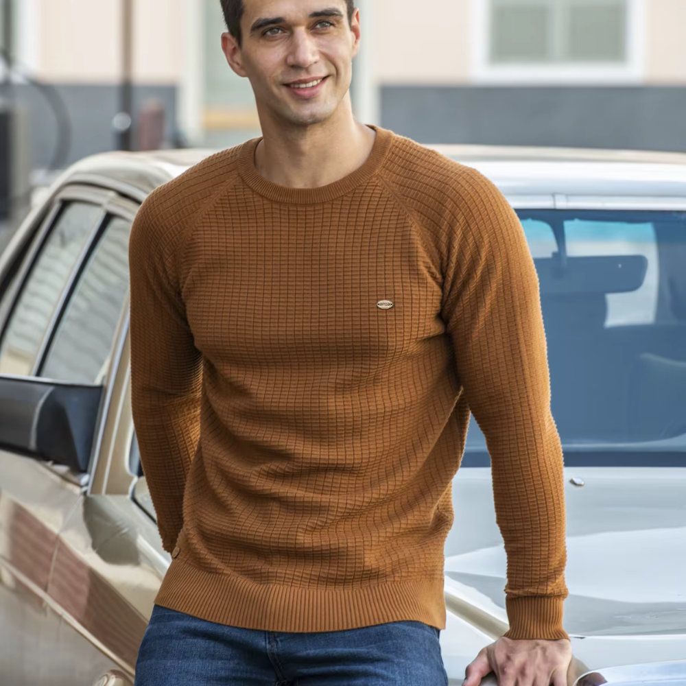 Man wearing the waffle knit sweater in brown