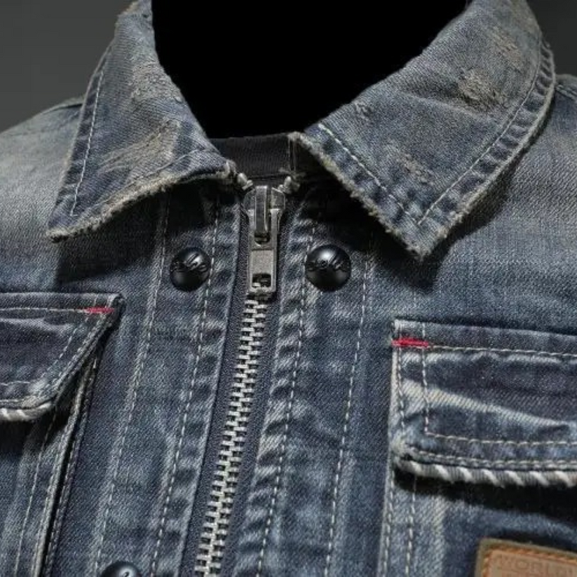 Close-up of the collar and pocket on the denim jacket