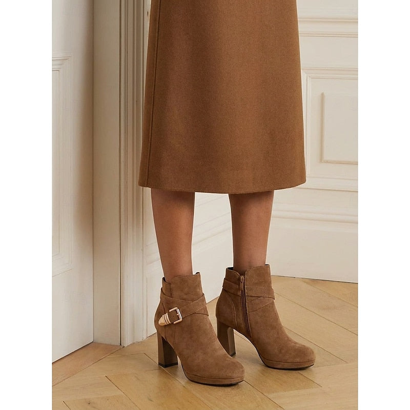Women's buckle strap ankle boots in light brown – worn standing