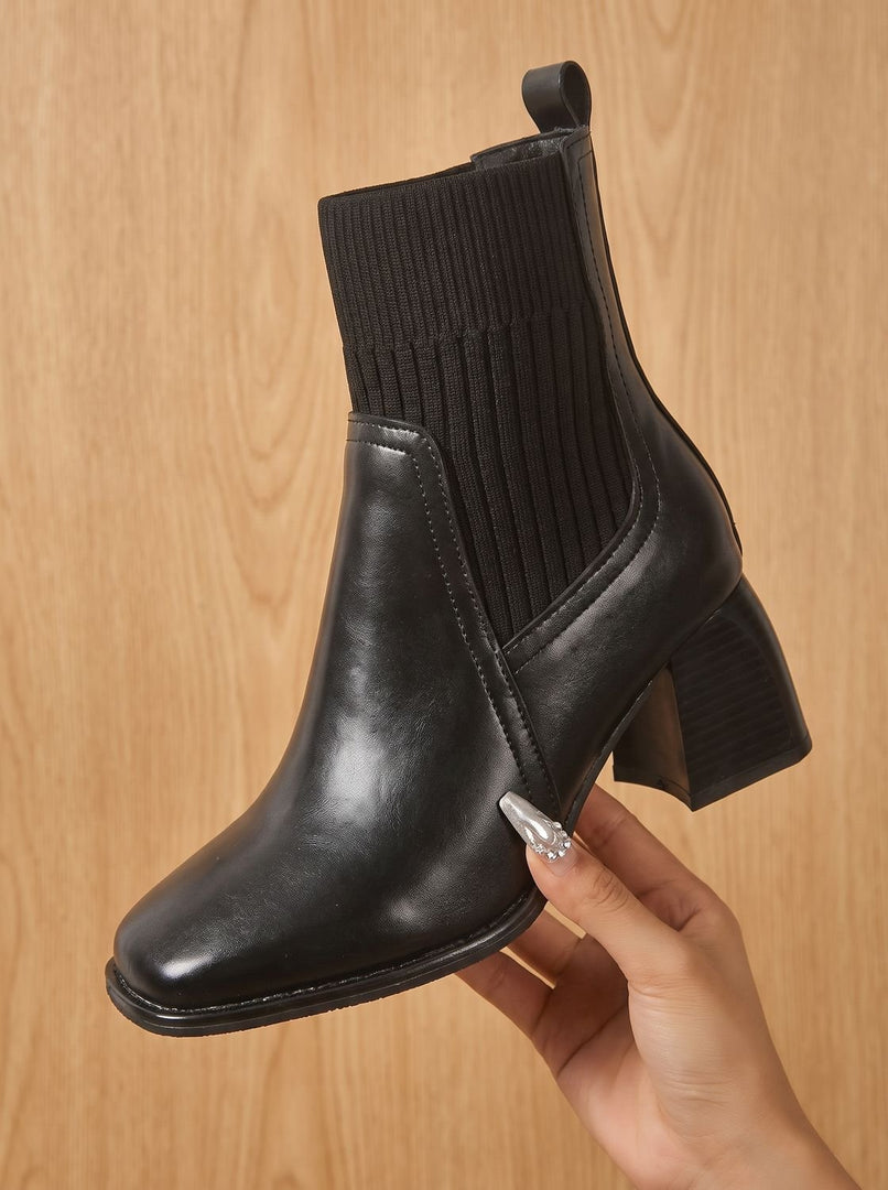 Women's knit shaft ankle boots in black – held