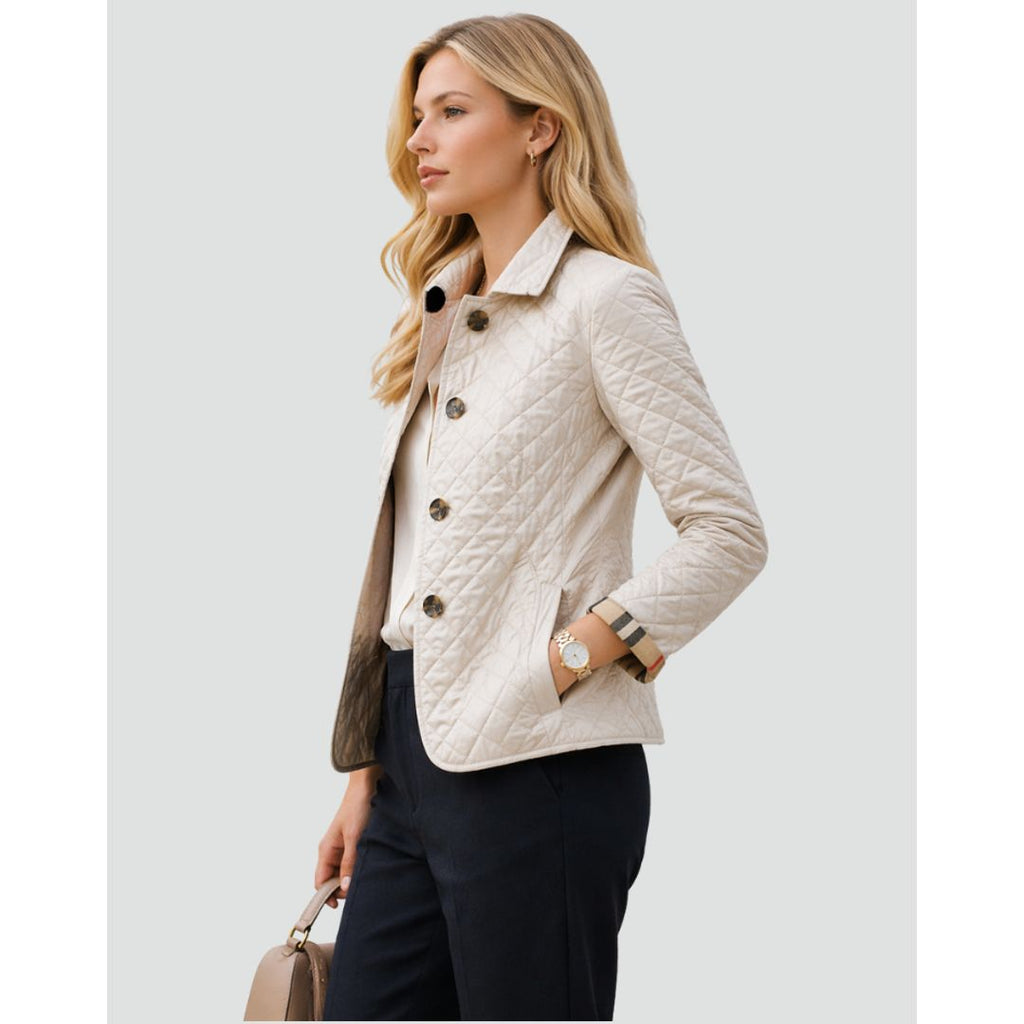 Women's diamond quilted jacket with check cuffs in cream, side view