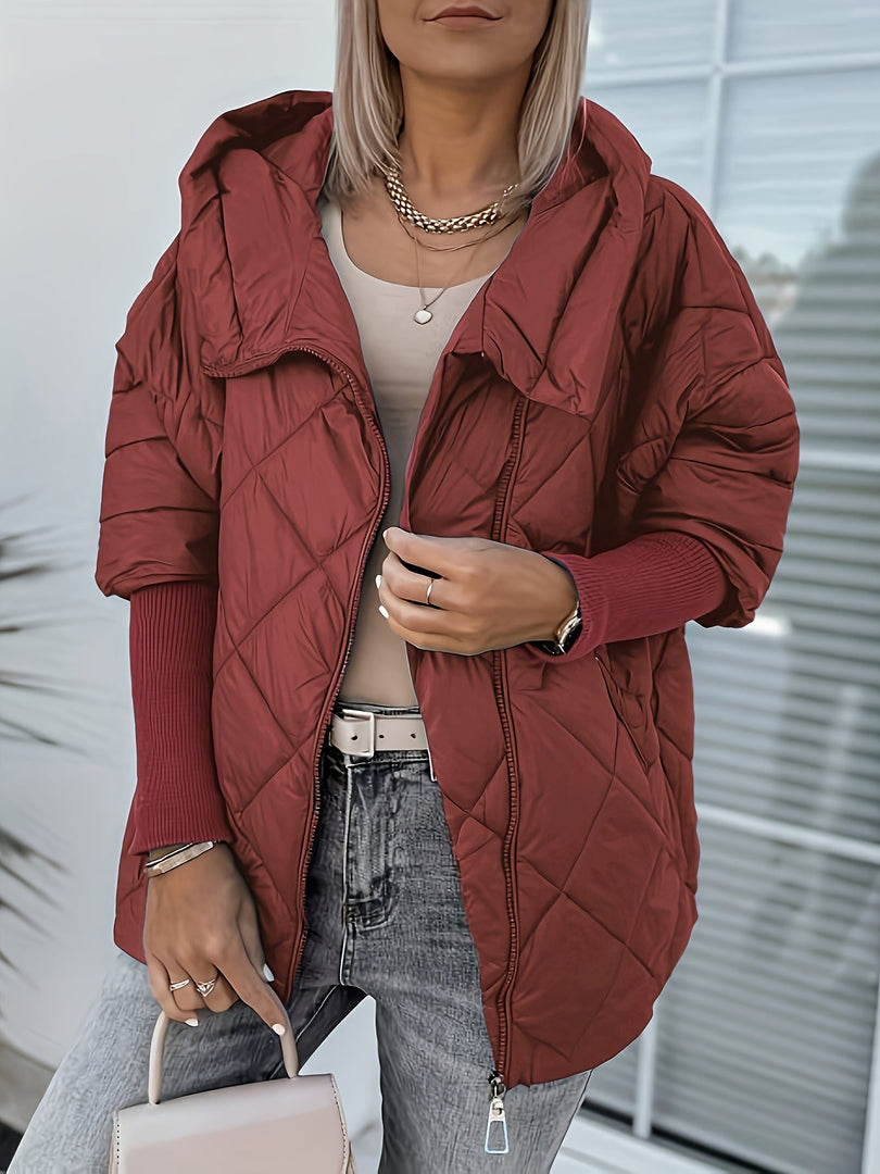 Women's diamond quilted hooded jacket in rust red – worn open