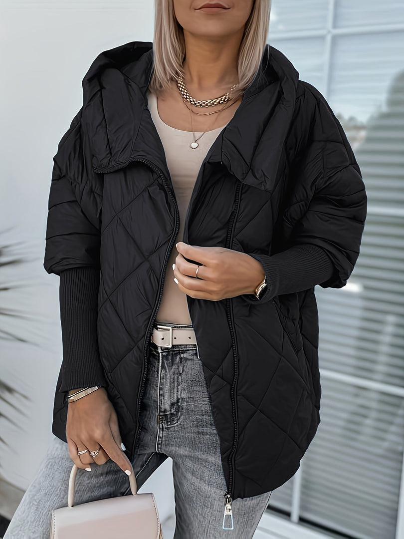 Women's diamond quilted hooded jacket in black – worn open