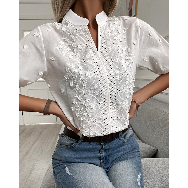 Women's white embroidered blouse – close-up