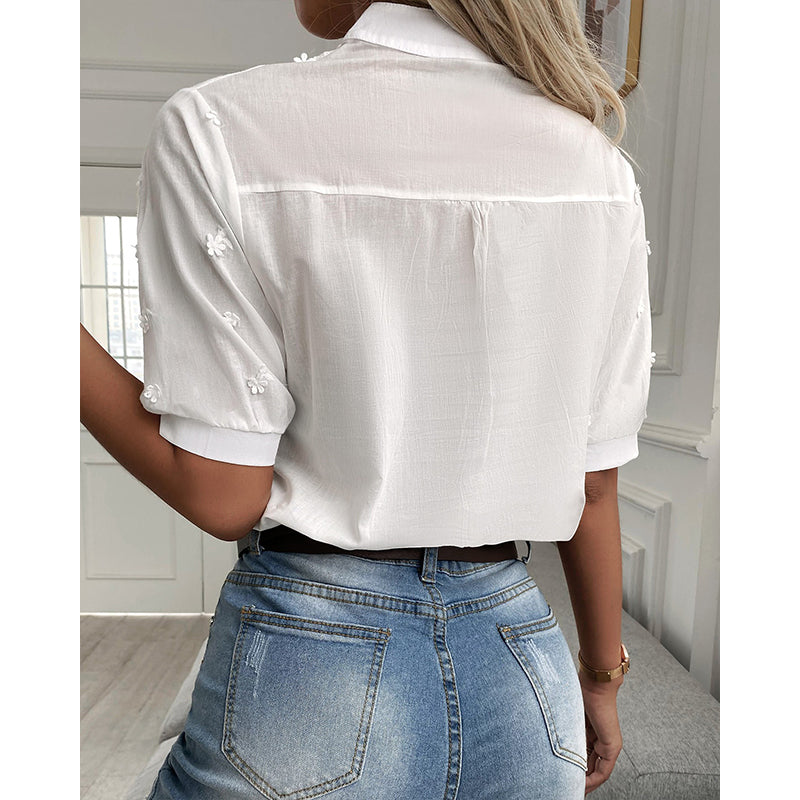 Women's white embroidered blouse – back view
