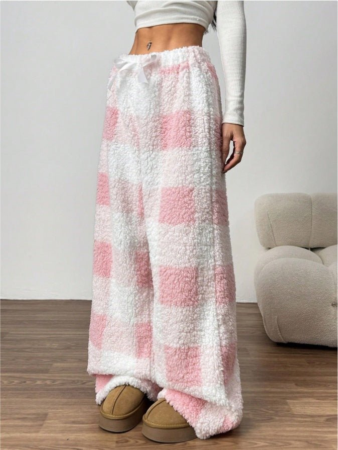 Women's fleece check lounge trousers in pink – side view