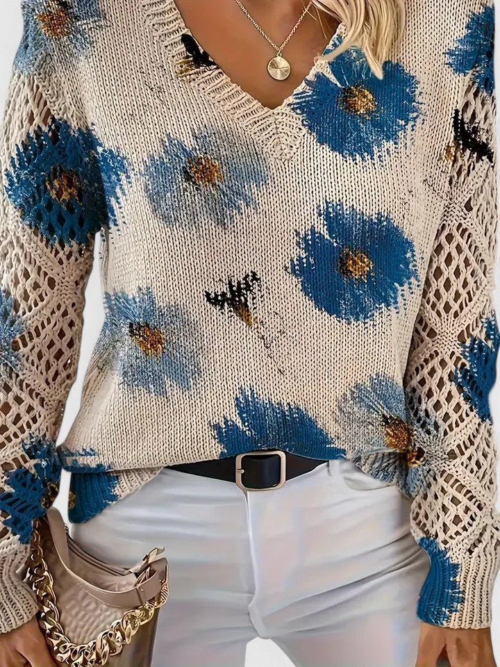 Women's floral openwork knit sweater in blue floral – close-up