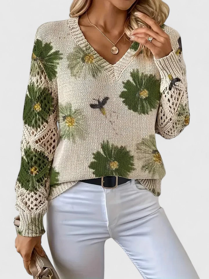 Women's floral openwork knit sweater in green floral – front view