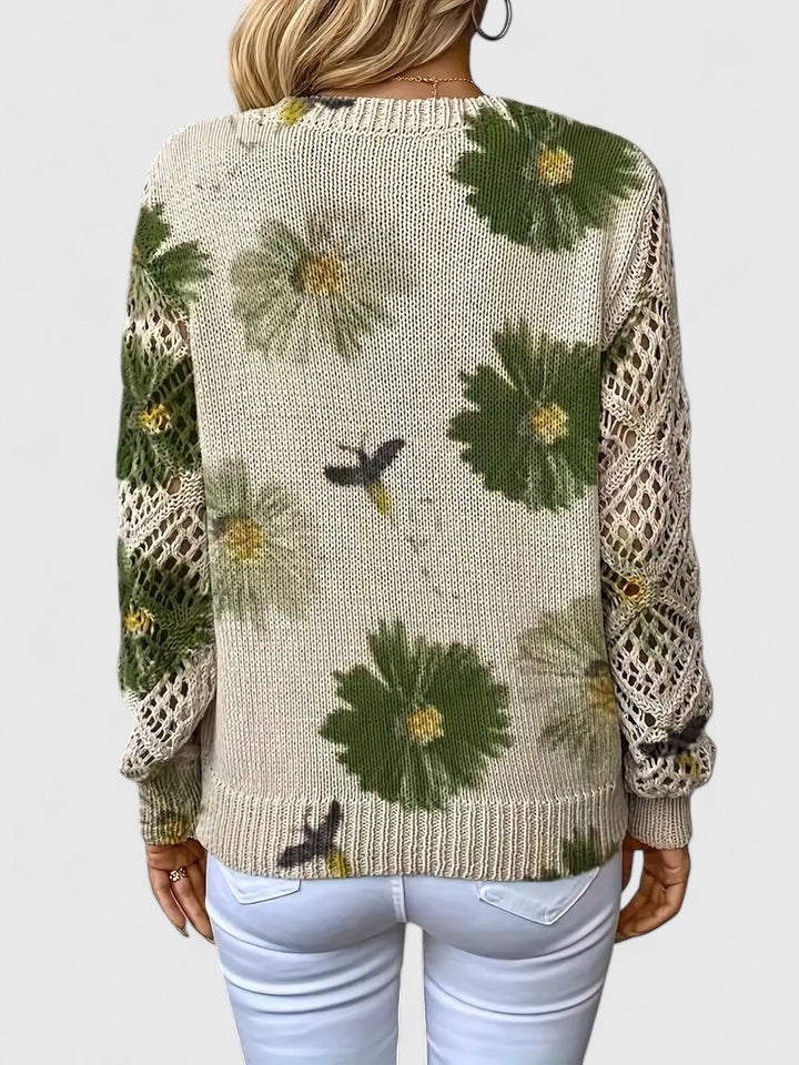 Women's floral openwork knit sweater in green floral – back view