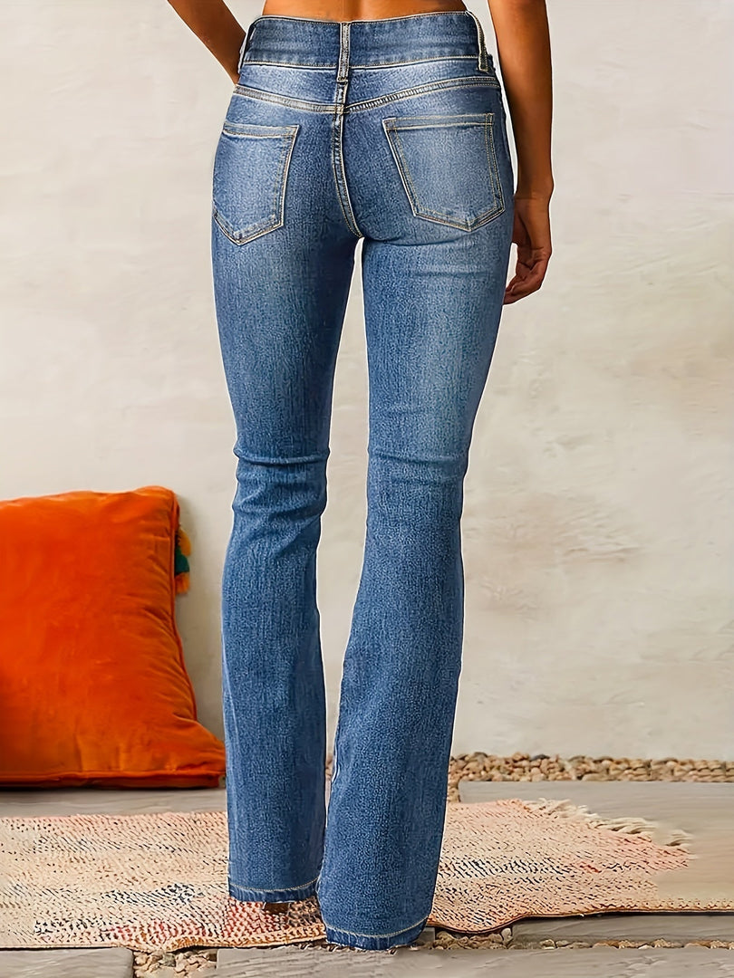 Women's high-waisted flared jeans in medium blue – back view
