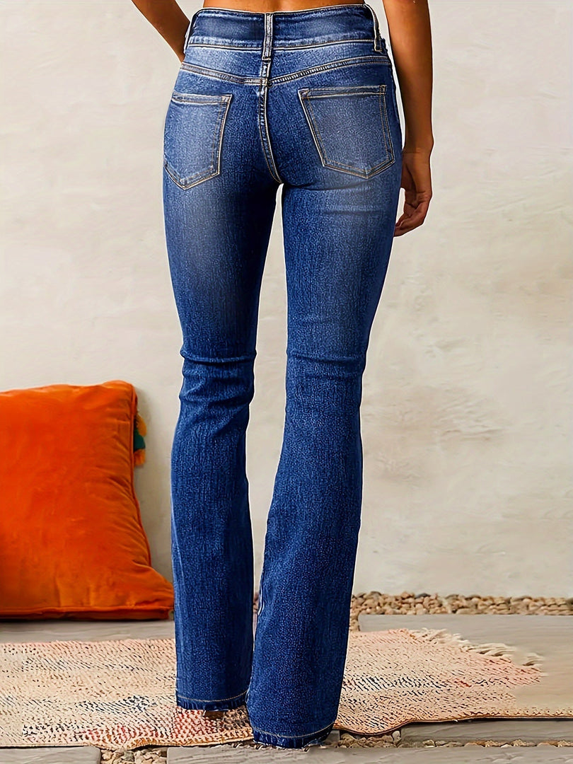 Women's high-waisted flared jeans in dark blue – back view