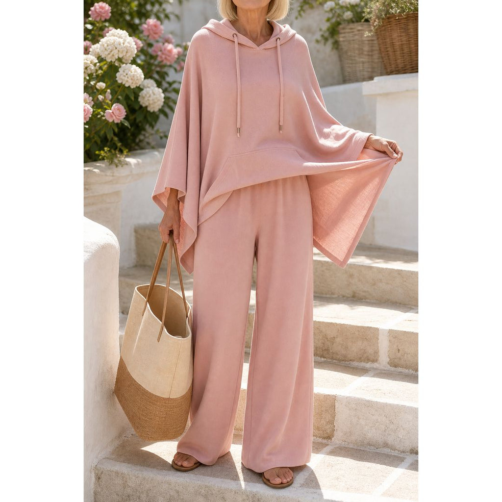 Women's hooded cape and wide leg trouser set in rose, on the steps