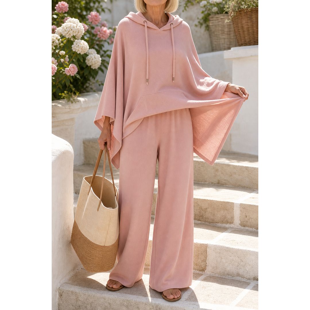 Women's hooded cape and wide leg trouser set in rose, on the steps