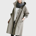 Women's hooded trench coat in grey – front view