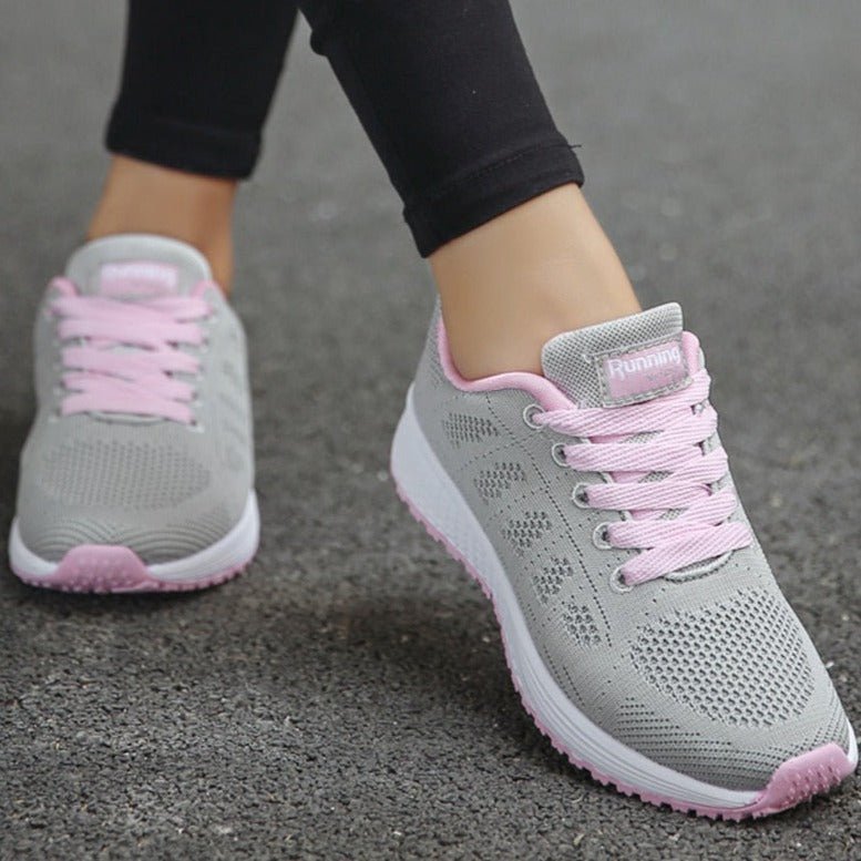Women's knit trainers in grey pink – side view