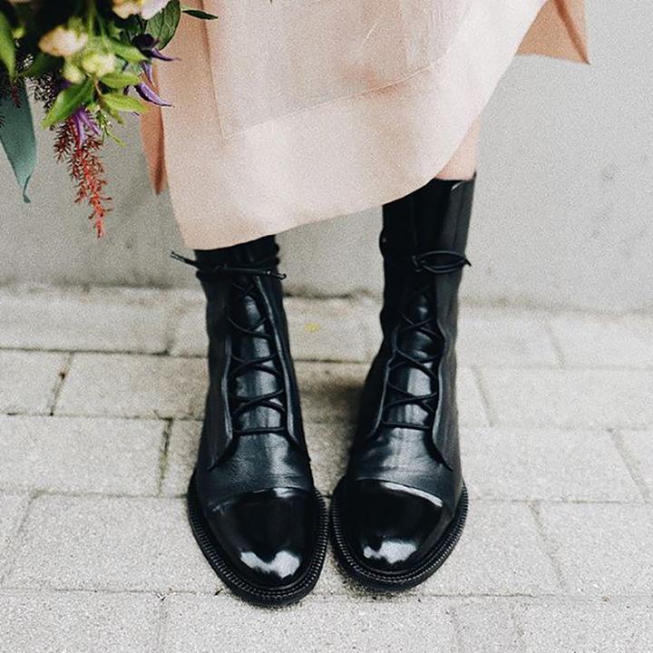 Women's lace-up mid-calf boots in black – worn with a dress