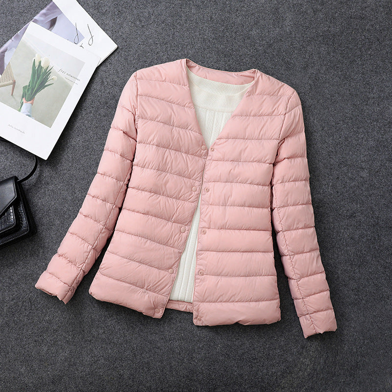 Women's lightweight quilted jacket in pink – flat view