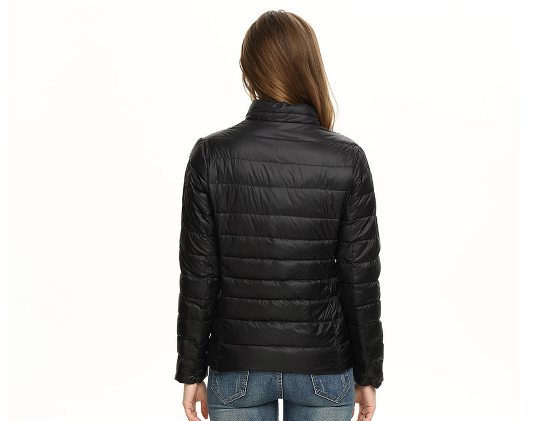 Women's stand collar puffer jacket in black – back view