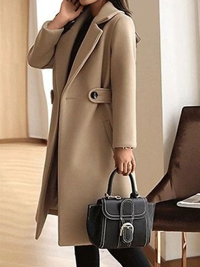 Women's long belted lapel coat in beige – front view