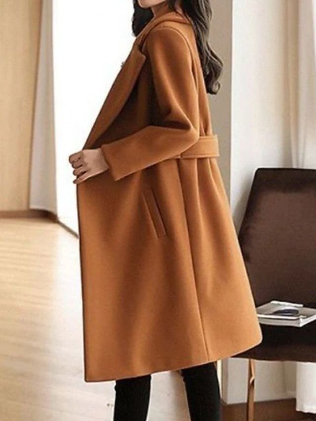 Women's long belted lapel coat in camel – worn open