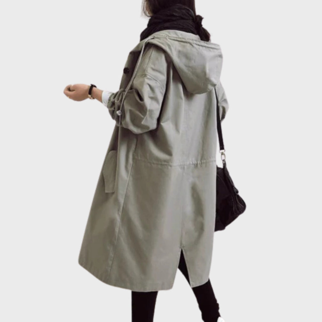Women's long hooded button parka in grey – walking