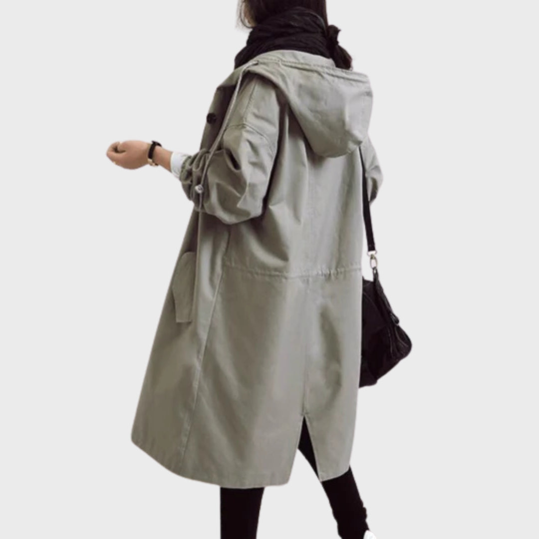 Women's long hooded button parka in grey – walking