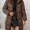 Women's long puffer coat with hood in brown