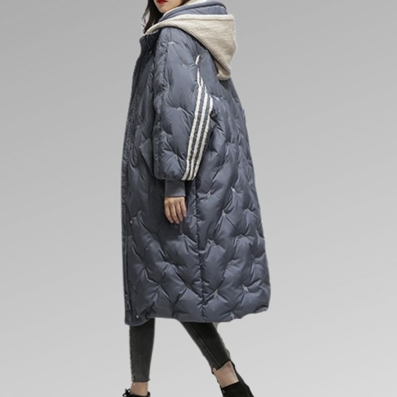 Women's long stripe detail quilted coat in slate blue – side view
