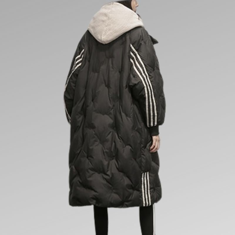 Women's long stripe detail quilted coat in black – back view