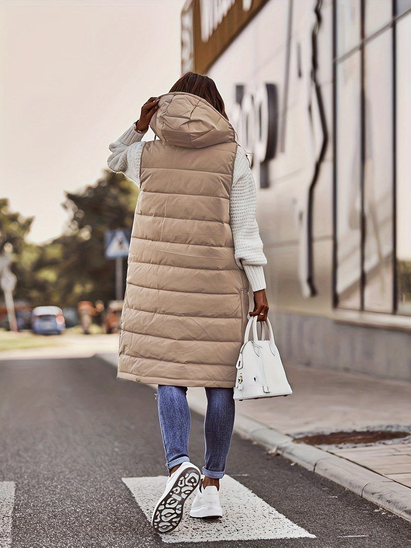 Women's long quilted hooded gilet in beige – back view