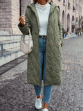 Women's long quilted hooded coat in green – walking