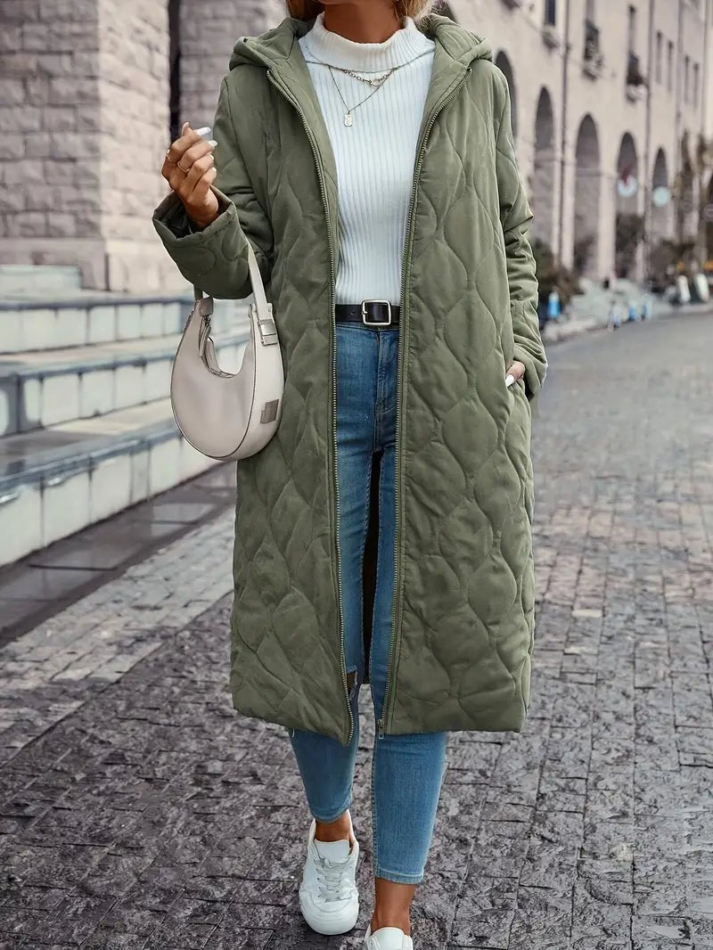 Women's long quilted hooded coat in green – walking