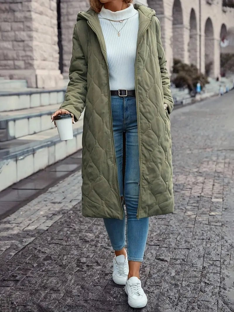 Women's long quilted hooded coat in green – front view
