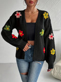 Women's flower appliqué cardigan in black – front view