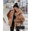 Women's oversized fluffy coat with hood in light brown – full-length look