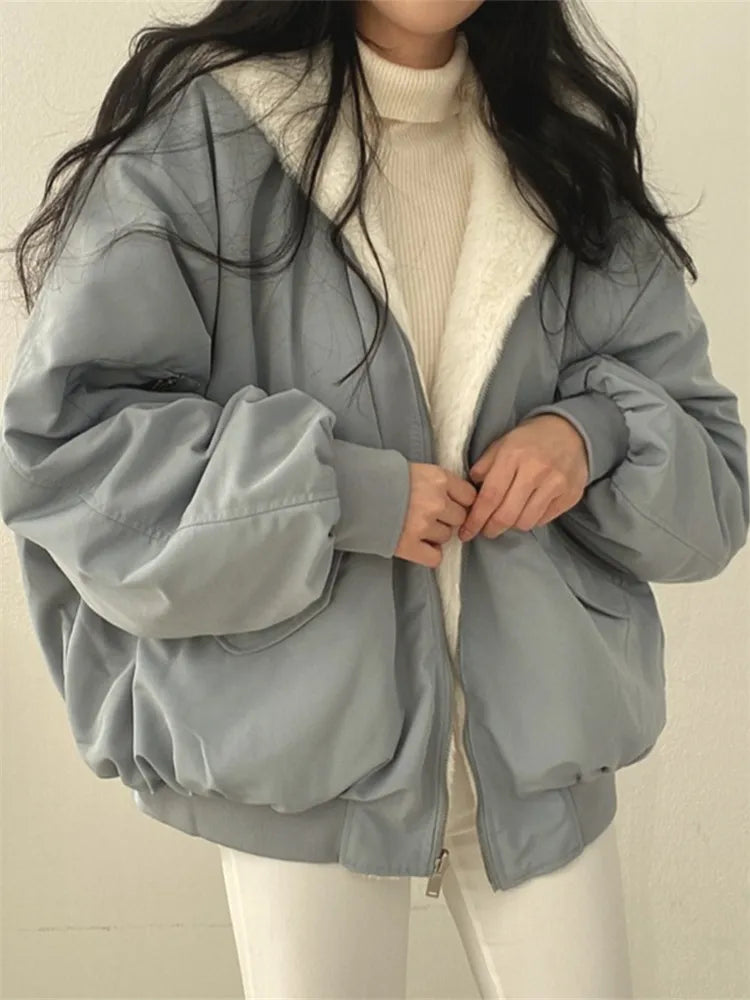 Women's oversized fleece lined jacket in blue grey – worn open